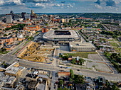 Cincinnati, United States - 18 July 2025: Aerial view of the stadium contrasting sharply with the urban environment and the sky above.