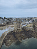 Aerial view of the imposing Tour Solidor standing steadfast against the tide, its stone walls a testament to history, Saint-Malo, Bretagne, France.
