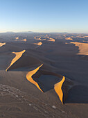Aerial view of beautiful and serene deadvlei dune with patterns and shapes in the arid desert, Hardap, Namibia.