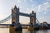 View of the iconic Tower Bridge, a majestic Victorian structure with intricate towers and suspension cables, spanning the tranquil waters, London, Greater London, United Kingdom.
