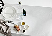 Table for One - table setting for one person with water and bread