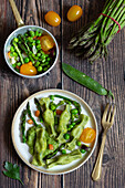 Green asparagus caramelle with ricotta filling