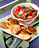 Cuculli (chickpea pancakes) with tomato salad