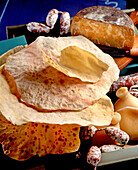 Pane Carasau with salami and cheese