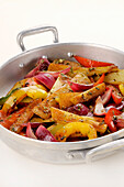 Colourful vegetable pan with oregano