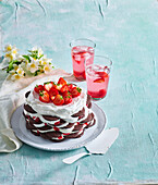 No-bake cookies cake with strawberries and whipped cream