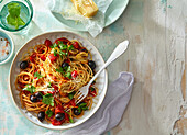 Pasta with tomatoes and olives fast to prepare