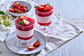 Strawberry dessert with marzipan creme in glass