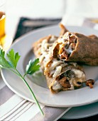 Rolled buckwheat pancake with mushrooms and Comté