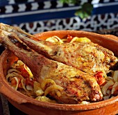 Leg of lamb with onion vegetables