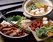 Drei Teller mit japanischen Gerichten