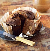 Banana cake in paper with knife