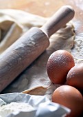 Ingredients dough flour egg egg rolling pin utensil product