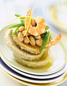 Artichoke hearts and bases with prawns and shell beans