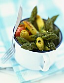 Pan-fried asparagus with thyme and olives