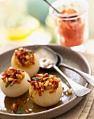 Stuffed onions with diced bacon and pine nuts