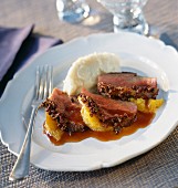 Duck breast with pepper and oranges