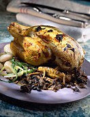 Roast chicken with vegetables and chanterelles