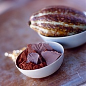 Dish of chocolate and cocoa bean