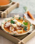 Carrot soup with rabbit and orange