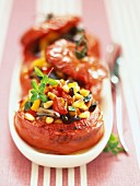 Tomatoes stuffed with grilled vegetables and pine nuts