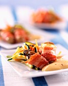 Oyster and bacon kebabs