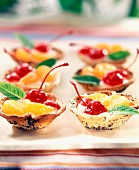 Individual cherry and clementine tarts
