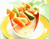 marinated salmon and raw vegetable skewers with yoghurt sauce