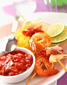 Prawn kebabs with stewed tomato sauce and saffron rice