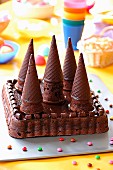 Chocolate birthday cake in form of castle