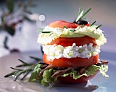 Tomato stuffed with goat's cheese and rosemary