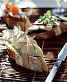 Fromage frais on bread with apple, shallots and rosemary