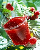 Pot of peach and raspberry jam