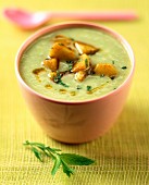 Creamed cucumber and mint soup with curried potatoes