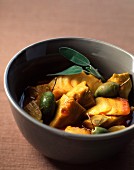 Cod, artichoke, tomato, olive and saffron soup