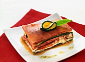 Lasagne mit Schinken, Zucchini, Tomaten und Basilikumöl