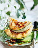 grilled melon with caramelised walnuts and sesame seeds