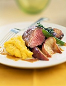 Duck breast with mashed potatoes and apples