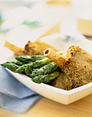 Lamb knuckle joint with honey crust and asparagus