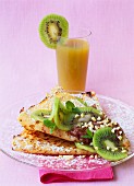 Pancake with melted chocolate and kiwi