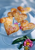 Heart-shaped biscuits covered with pink sugar