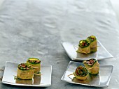 Goat's cheese and olive zucchini rolls