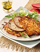 thin potato cakes with chitterlings sausage