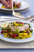 Grilled tuna steak with peppers