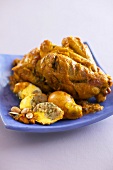 Chicken with eggs stuffed with almonds