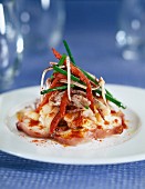 octopus and lobster with vegetables and paprika