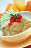 Apple compote with ginger and raspberries