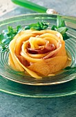 Melon and Parma ham with basil in the shape of a flower