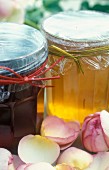 Jars of jelly and peony petals
