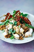 Steamed vegetables with walnuts and bacon